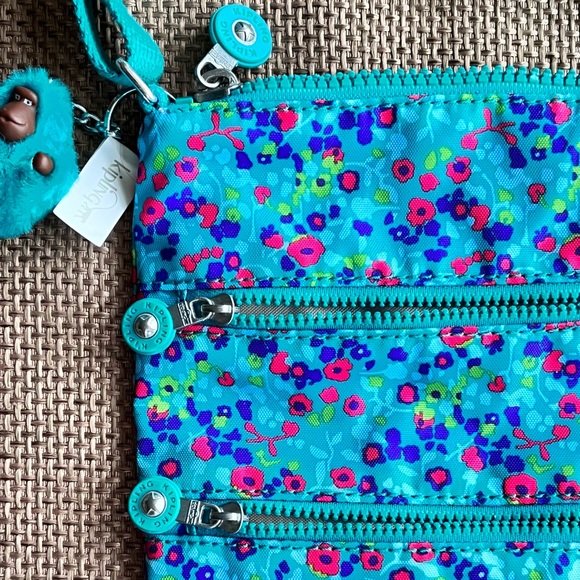 Kipling Women's Crossbody Handbag with Adjustable Strap and Bag Charm - Picture 3 of 9